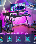 40 Inch L Shaped Gaming Desk With Power Outlet And LED Lights, carbon fiber texture, monitor stand, in small gaming room