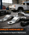 Stainless Steel Universal Joint Strap Kit With Bolts For Rear Driveshaft Replacement shown in an automotive workshop.