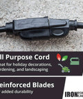 10 Gauge 3 Conductor Lighted Outdoor Extension Cord For Indoor And Outdoor Use with reinforced blades on gravel surface