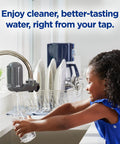 Girl using Vertical Faucet Mount Water Filtration System With Lead Reducing Filter No Brainer Easy Install 100 Gallon Capacity