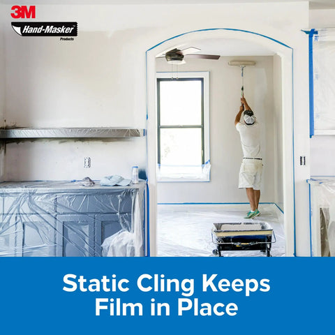 Painter using Pro Grade Masking Film For Indoor And Outdoor Use 72 Inch By 90 Foot Roll With Static Cling Keeps Film In Place.