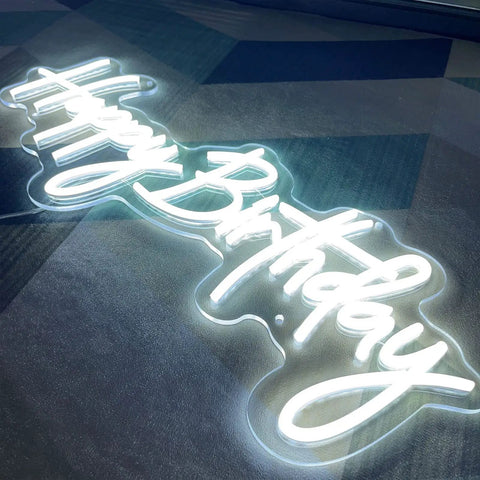 Close-up of Birthday Neon Sign LED Wall Backdrop 23.6x9.45 Inches Custom Party Neon Light glowing on dark surface.