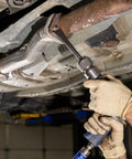 Using 20-Piece Pneumatic Tool Set With Black Oxide Finish, Pro-Grade Precision Fit Tools on car undercarriage