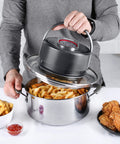 Person using Digital Universal Air Fryer Lid Turns Any 6, 8, And 10 Quart Pot, Pan, Or Pressure Cooker Into An On Demand Air Fryer