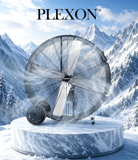 Heavy Hitter 42 Inch Industrial Drum Fan Moves Serious High Velocity Air For Garage Or Workshop Cools 24500 CFM With Smooth Rolling Casters Two Pack No Fuss Design on a snowy mountain backdrop.