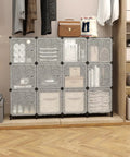 12 Cube Storage Organizer With Doors For Bedroom And Living Room DIY Plastic Closet Shelf Modular Bookshelf Stackable Cube Shelving Rack Black Dope Easy Assembly For Apartment Living And Home Organization in use on floor filled with clothes and items