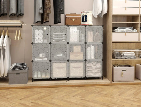 12 Cube Storage Organizer With Doors For Bedroom And Living Room DIY Plastic Closet Shelf Modular Bookshelf Stackable Cube Shelving Rack Black Dope Easy Assembly For Apartment Living And Home Organization in use on floor filled with clothes and items