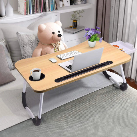 Foldable Laptop Desk For Bed Or Couch with drawer, used as a table for computer and coffee, ideal for sofa or floor use.