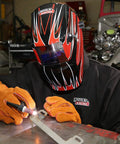 Welder wearing Black X Large Flame Resistant Welding Jacket With Cotton Nine Ounce Fabric, Worksite Ready, KH808XL in workshop.