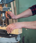 Heavy Duty Drill Press Vise 4 Inch Bench Vise With Quick Adjust Jaw Clamp and Multi Groove Soft Jaw Pads in use on drill press