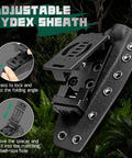 Adjustable Kydex sheath for Rugged Fixed Blade Outdoor Knife With D2 Steel Blade and Toothed Spine Full Tang shown in forest setting.