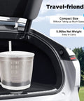 No Sweat Hand Crank Washing Machine Two In One Manual Washer And Spin Dryer Road Trip Ready Ultra Light Portable Mini Laundry Pal Perfect For Campers And Outdoorsmen Grey in car trunk, showing compact size and lightweight design.