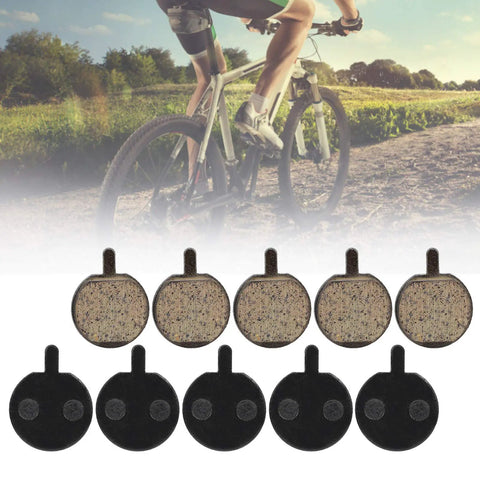Five Pairs Semi Metal Bicycle And Scooter Disc Brake Pads For Front And Rear Replacement On Electric Bikes And Scooters High Performance Braking For Wet Or Dry Conditions, displayed with a cyclist background