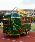 Straight Up Commercial Food Truck Trailer Featuring Custom Coffee Bar Station And Heavy Duty Snack Cart Prep Table To Crush Your Street Vendor Hustle Or Mobile Catering Business, green exterior, with decorative lights.