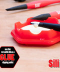 Glue Pod With Three Micro Glue Brushes And Sealable Lid Set on a table, with flat tapered tip brush in use