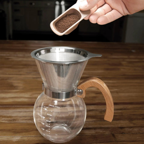 Next Level Pour Over Coffee Maker With Heat Resistant Borosilicate Glass Carafe And Comfortable Bamboo Handle Plus Durable Stainless Steel Filter for coffee brewing.