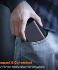 Person placing Grab And Go 27 In 1 Magnetic Precision Screwdriver Set into jeans pocket, showcasing compact design.