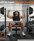 Man lifting weights on Adjustable Weight Bench With Squat Rack For Home Gym Use 770Lb Heavy Duty Olympic Bench Press Versatile Setup