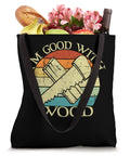 Totally Nailed It Dope Vintage Circular Saw Woodworking Tote Bag For Carpenters And DIY Craftsmen Plus Sweet Shop Essential Gift For True Makers Who Legit Appreciate Fine Timberwork And Quality Hand Tools, 16x16 inch black tote filled with fruits and flowers.