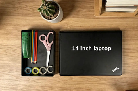 Rectangular Plastic Desk Organizer with Durable Storage Trays for Office Essentials and Pen Holder next to 14 inch laptop