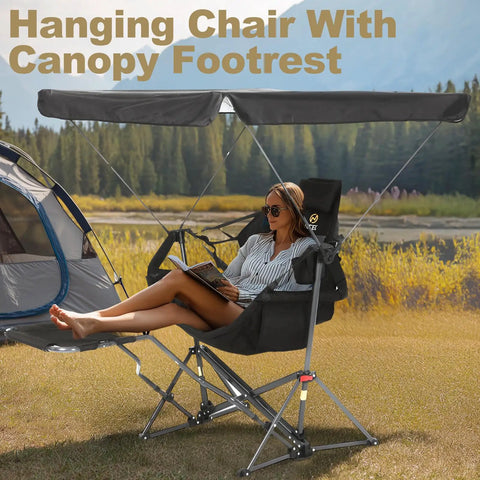 Comfy Hammock Chair With Canopy And Detachable Footrest in outdoor campsite setting