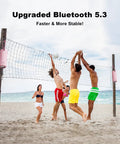 Outdoor Portable Bluetooth Boombox Speaker Waterproof hanging on beach volleyball net, ideal for playtime sounds.