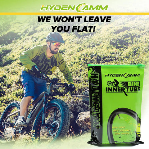 Cyclist rides bike with 2 Pack Fat Tire Bike Inner Tubes 20x3.0 20x3.3 20x3.5 With Schrader Valve And 2 Tire Levers package.