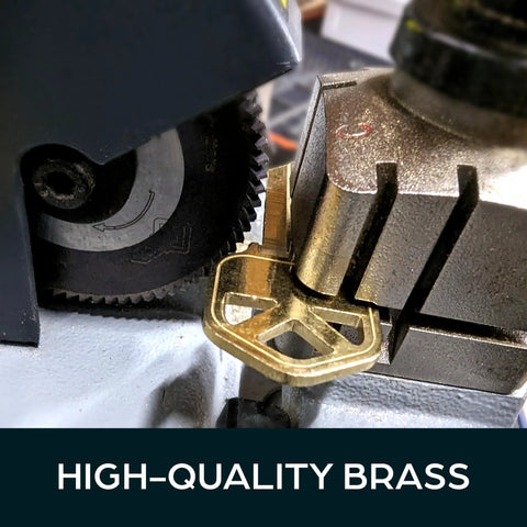 Premium Brass Kw1 Uncut Key Blanks Pack Of 50 for Home and Professional Use being shaped in key cutting machine