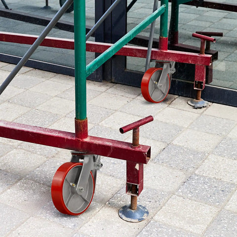 Heavy Duty 8x2 Inch Scaffolding Wheel Set Of 4 With 4400 Lb Capacity, Polyurethane On Steel Wheels installed on scaffold