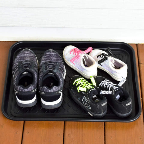 Two Pack Boot Tray Organizer For Shoes And Boots 20 By 15 Inches Heavy Duty Flex Plastic with kids' and adults' shoes placed on it