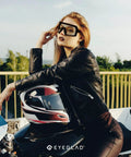 Badass Photochromic Safety Glasses with No Cap Impact Resistance for Cycling and Motorcycle Riding Featuring Rustproof Frames and Lightweight ANSI Z87 Approved Gear That Slaps for Worksite or Outdoor Adventures worn by a model in a leather jacket.