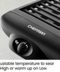 Close-up of smokeless indoor grill with nonstick cooking surface and adjustable temperature dial, Chefman brand.