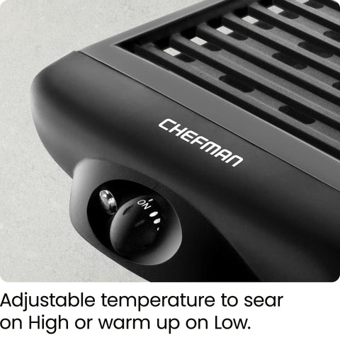 Close-up of smokeless indoor grill with nonstick cooking surface and adjustable temperature dial, Chefman brand.