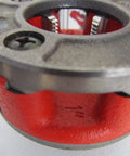 Close-up of Pro Grade 1 Inch Die Head Hand Threader With Alloy Dies And 00-R Die Set, showing threading mechanisms.