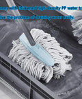 Close-up of floor mounted broom and mop holder rack with thick rubber clips, showing a mop in a water tray for easy drainage.
