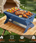 Portable Camping Grill And Fire Pit Foldable 2 In 1 Charcoal Wood Gas BBQ With Carry Bag Heavy Duty Stainless Steel on table