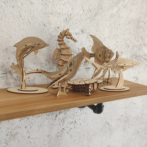 Six Piece 3D Wooden Sea Animals Puzzle Set For Adults And Teens Totally Eco Friendly 3mm Wood Brain Teaser And STEM Gift Build Hands On Fun With Dolphins Whales Turtles Sharks Seahorses And More At Home displayed on shelf