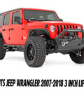 Suspension Dudes front sway bar stabilizer kit installed on red Jeep Wrangler with lifted suspension