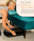 Woman storing Waver Mini Vibration Plate For Full Body Toning And Lymphatic Drainage under sofa