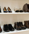 8 Pack Acrylic Shelf Dividers for Closet Organization showcasing clear adjustable spacers for shoes on white shelves.