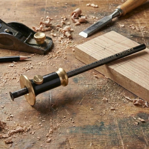 Top Shelf Wheel Marking Gauge with Precision Rolling Cutter and Sleek Bearing on wooden workbench with wood shavings