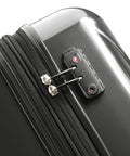 Close-up of Delsey Paris Helium Aero hardside luggage in brushed charcoal with TSA lock and double zipper.