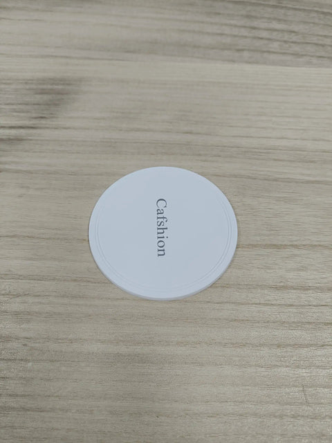 Label for heavy duty furniture moving sliders on a wooden surface, showcasing round glide pad design for easy couch moving.