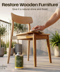 Natural Linseed Oil Wood Protector And Clear Varnish 500 Ml by a person applying finish on a wooden chair.