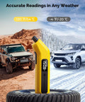 Front view of a yellow digital tire pressure gauge with LED display standing on a tire