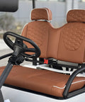 Pull Up In Style With This Badass Two Seater Golf Cart Featuring A Rock Solid Aluminum Cargo Bed 48V Lithium Battery Epic 4Kw Motor Sweet Directional Handling And Vibrant Yellow Paint For Total Neighborhood Dominance with tan cushioned seats and steering wheel