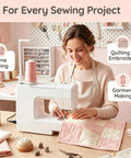 Heavy Duty Thread Spool Stand For Sewing Machines Featuring A Sick Anti Tangle Guide And Jumbo Cone Holder Totally No Sweat Bracket For Quilting Embroidery Setup Straight Up Smooth Operation In White with a white sewing machine and quilt.