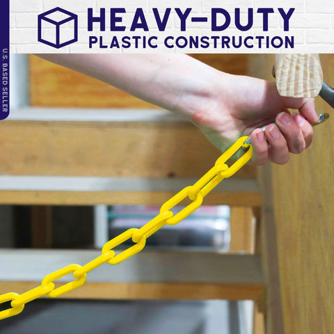 Yellow Plastic Barrier Chain For Safety And Crowd Control, 125 Feet Long And 2 Inches Wide, person holding chain