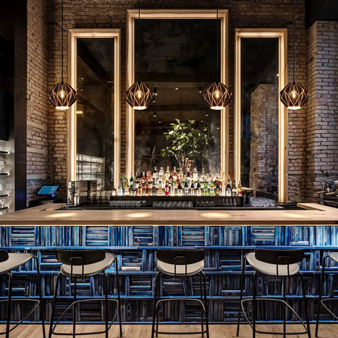 Industrial Vintage Pendant Light With Diamond Geometric Shade in Matte Black over bar counter in modern setting