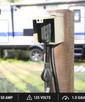 36 Foot 50 Amp RV Extension Cord With 14 50P Plug And 14 50R Receptacle, Outdoor STW Cable in use, connecting to power outlet